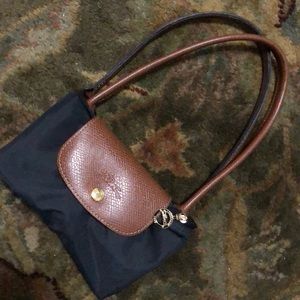 $70 MEDIUM BLACK LONG CHAMP HANDBAG